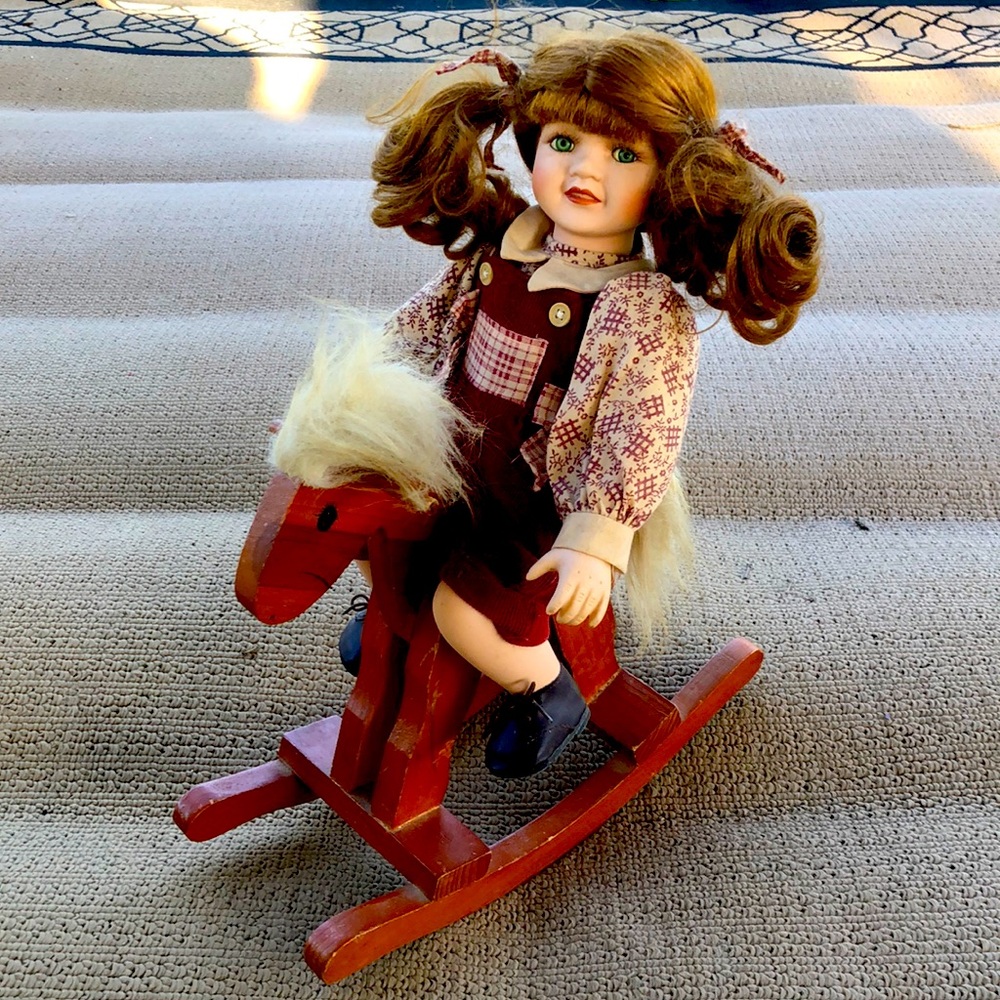 Vintage Porcelain Doll Sitting On Wooden Rocking Horse Red Corduroy Jumpsuit